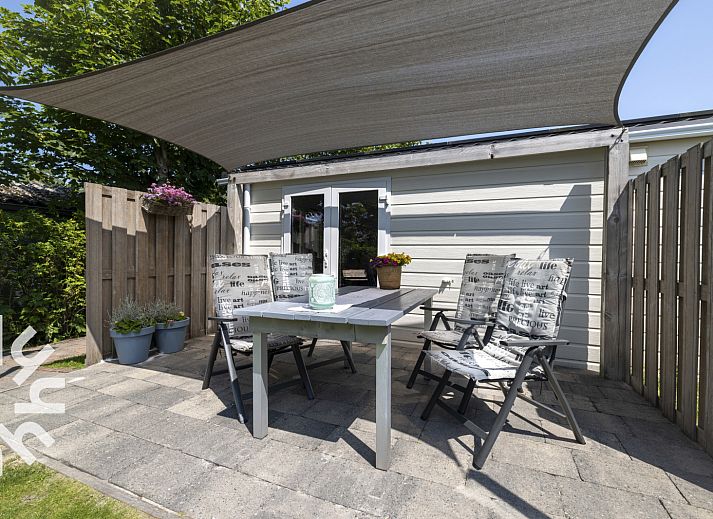 Gemuetliches Interieur des Ferienhauses NH392 in Schoorl, Nordholland.