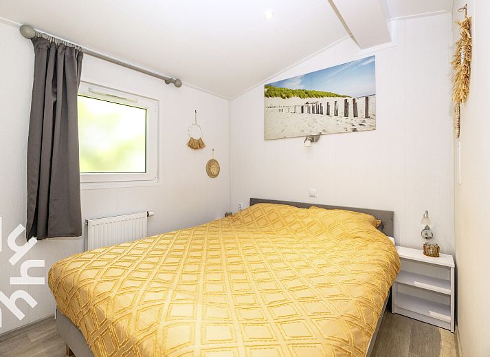 Gemuetliches Interieur des Ferienhauses NH392 in Schoorl, Nordholland.