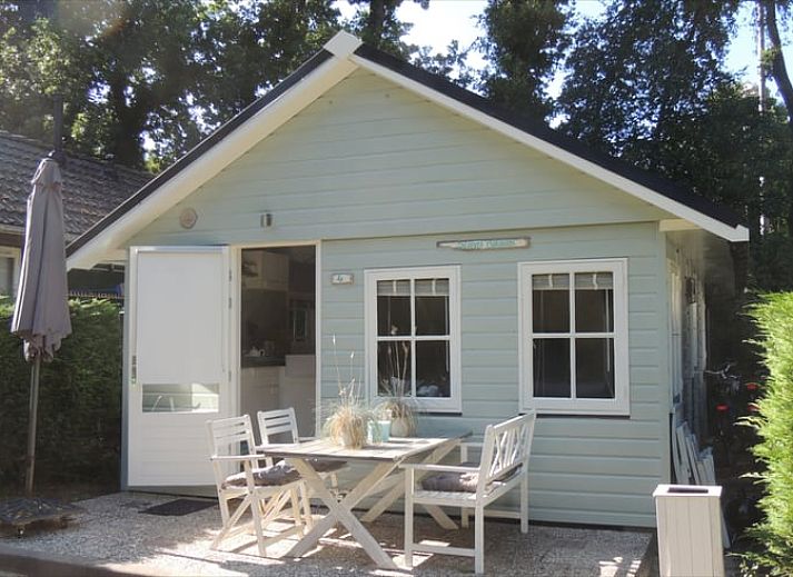 Enjoy the peace and quiet at Huisje in Schoorl, a charming vacation home in North Holland with a sunny terrace surrounded by nature.