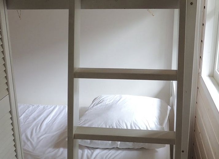 Cozy living room in a cottage in Schoorl, North Holland. Vacation home with bright interior and modern furnishings surrounded by nature.