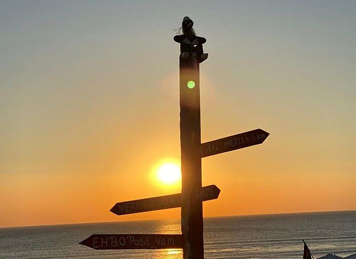 Cozy living room in a cottage in Schoorl, North Holland. Vacation home with bright interior and modern furnishings surrounded by nature.