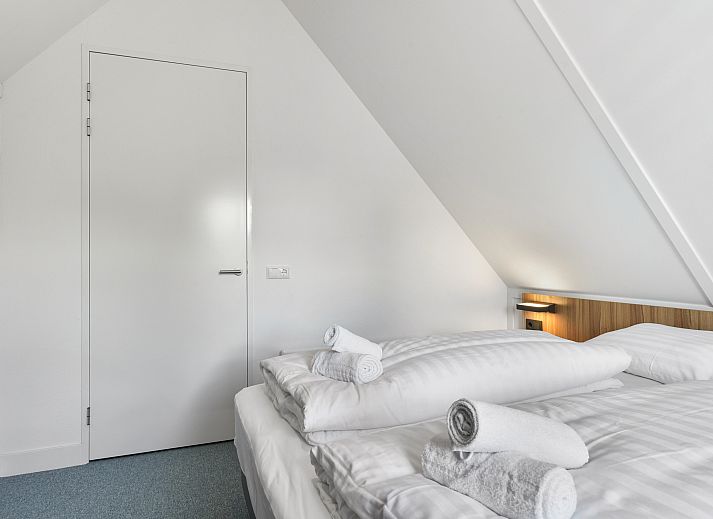 Gemuetliches Wohnzimmer mit Kaminofen in Berger Duinen, 8-Personen-Haus in Schoorl.