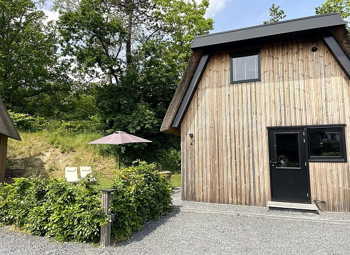 Veranda of the 6-person Dune Lodge with Charging Point in Schoorl, North Holland. Enjoy nature and tranquility in this vacation accommodation.