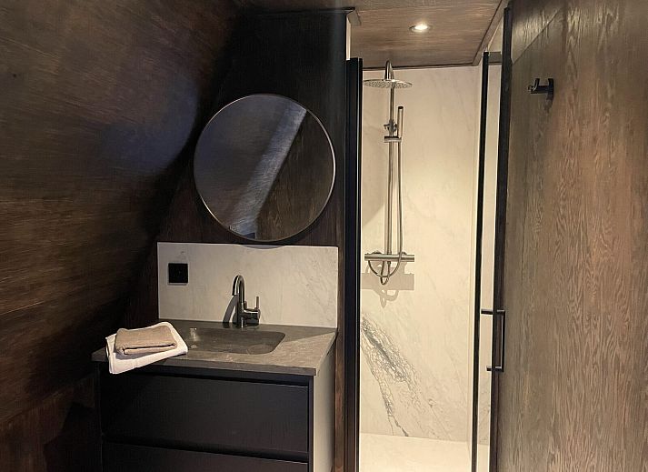 Cozy terrace at 6-person Dune Lodge in Schoorl, surrounded by nature.