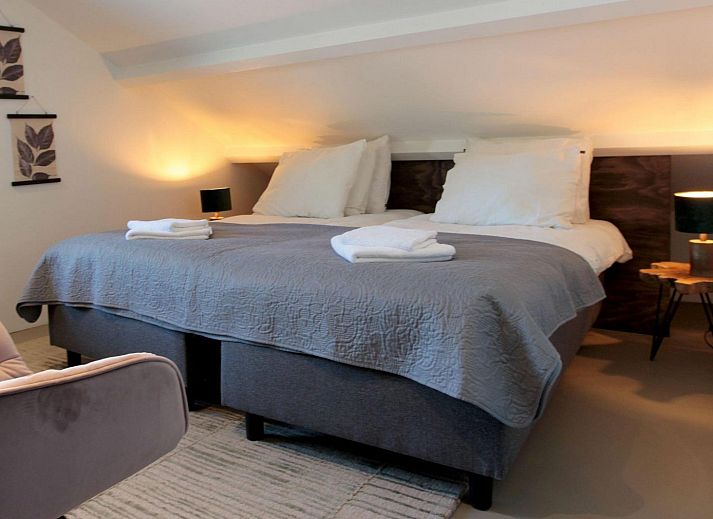 Gemuetlicher Essbereich im Freien in der Duinlodge, einem Ferienhaus mit 8 Plaetzen in Schoorl, Nordholland.