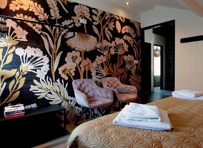 Stilvolles Wohnzimmer in der 8-Personen Duinlodge, Ferienhaus in Schoorl, Noord-Holland.