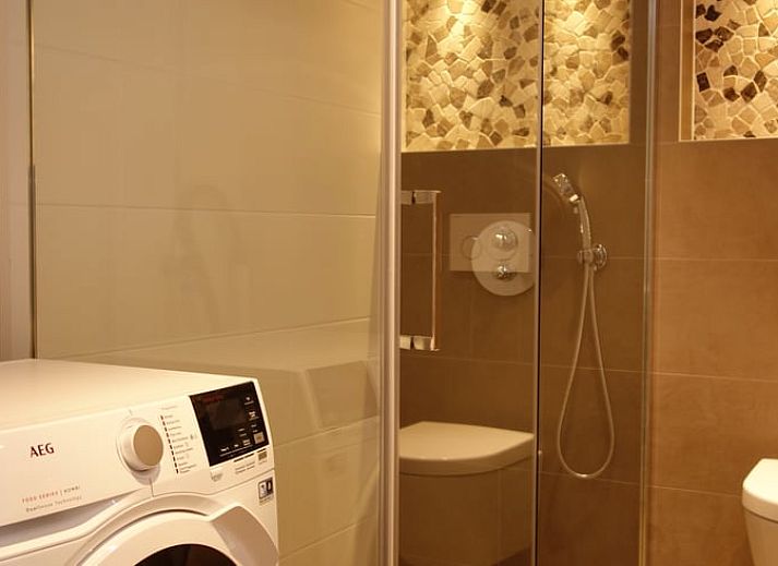 Geniet van de tuin en het terras bij Huisje in Schoorl, een gezellig vakantiehuis in het groene Schoorl, Noord-Holland.