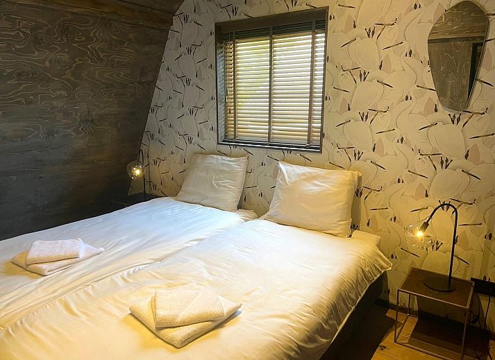 Eethoek met open haard in 8-12 persoons Groepsverblijf in Schoorl, Noord-Holland.