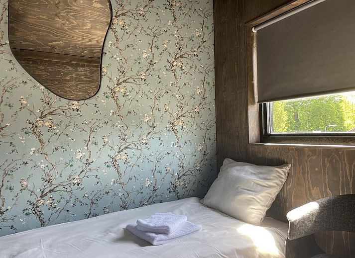 Eethoek met open haard in 8-12 persoons Groepsverblijf in Schoorl, Noord-Holland.