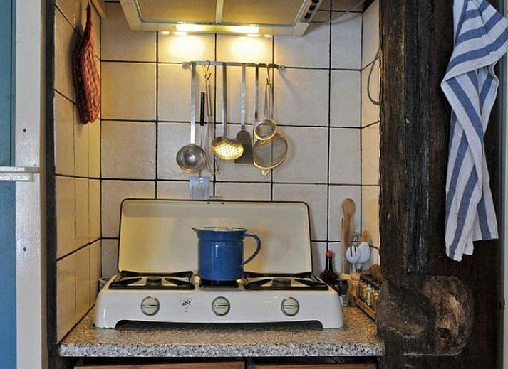 Enjoy the sunny terrace at Vakantiehuis in Schoorl, a charming vacation home in the green surroundings of North Holland North.