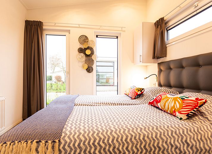 Naturlodge fuer 4 Personen Wellness in Berkhout, Nordholland, mit moderner Veranda und entspannendem Spa in natuerlicher Umgebung.