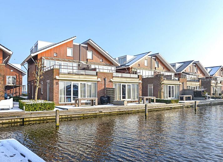 Apartment Assum I in Uitgeest, North Holland offers a beautiful view of the water from this modern vacation home.