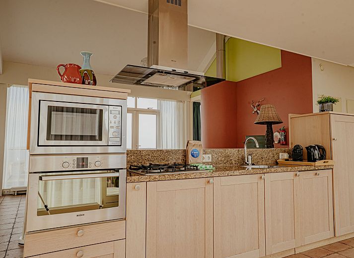 Schlafzimmer im Apartment Penthouse, Uitgeest, Nordholland, mit bequemen Betten und moderner Einrichtung.