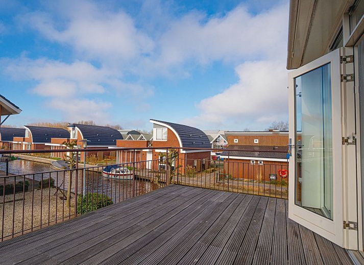 Schlafzimmer im Apartment Penthouse, Uitgeest, Nordholland, mit bequemen Betten und moderner Einrichtung.