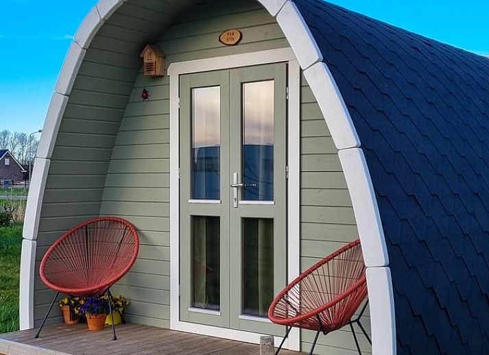 Geniet van de zonsondergang bij Huisje in Zuid-Scharwoude, een vakantiehuis in Noord-Holland, omringd door natuur.