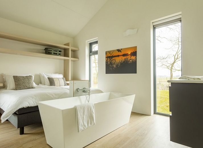 4-person Boekesteyn vacation home in Loosdrecht, North Holland with modern architecture and green surroundings.