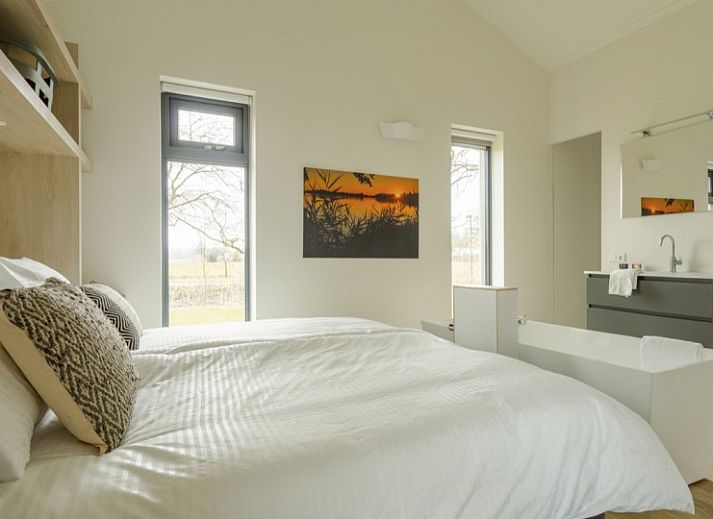 Cozy terrace at 4-person Boekesteyn in Loosdrecht, North Holland, surrounded by autumn colors.