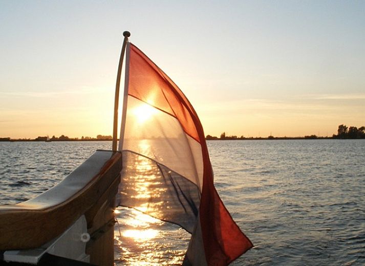 Cozy terrace at 4-person Boekesteyn in Loosdrecht, North Holland, surrounded by autumn colors.