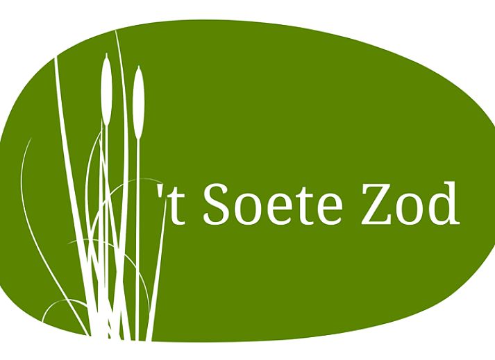 Rustic terrace at cottage in Kortenhoef, North Holland, overlooking green surroundings.