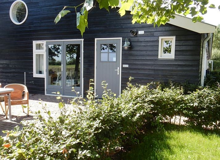 Cozy terrace at Holiday home in Weesp, Amsterdam eo, North Holland, surrounded by green nature and peaceful surroundings.