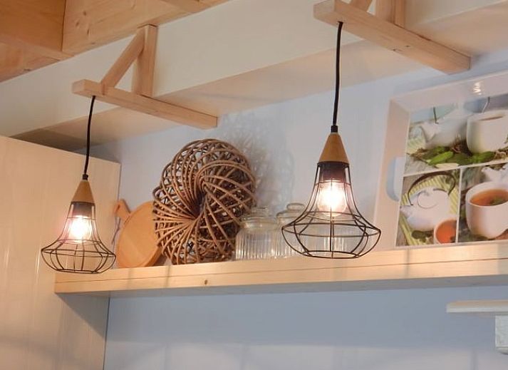 Stylish living room of Holiday Home in Weesp, Amsterdam eo, North Holland with comfortable seating area and plenty of natural light.