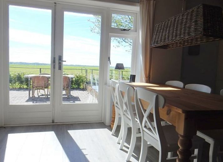 Cozy living room of Holiday home in Weesp, Amsterdam e.o., North Holland with cozy fireplace and comfortable sofa.