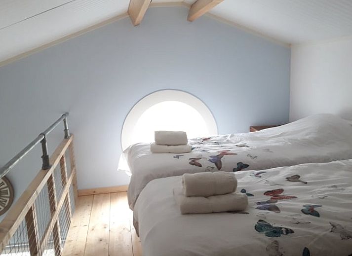 Cozy living room of Holiday home in Weesp, Amsterdam e.o., North Holland with cozy fireplace and comfortable sofa.