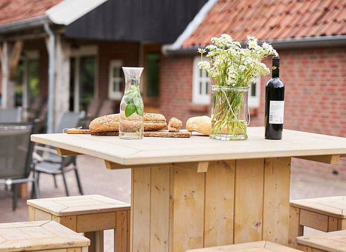 Cozy dining area in Cottage in Mander, vacation accommodation in Twente.
