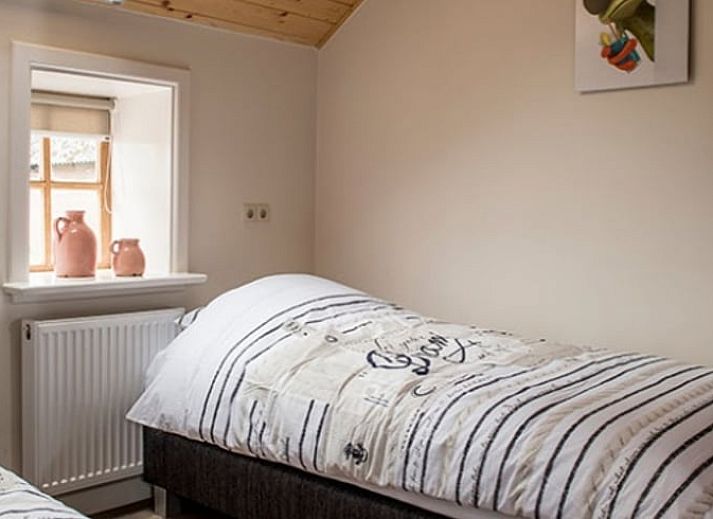 Charmant vakantiehuisje in Mander, Twente, met authentieke bakstenen gevel in Overijssel.