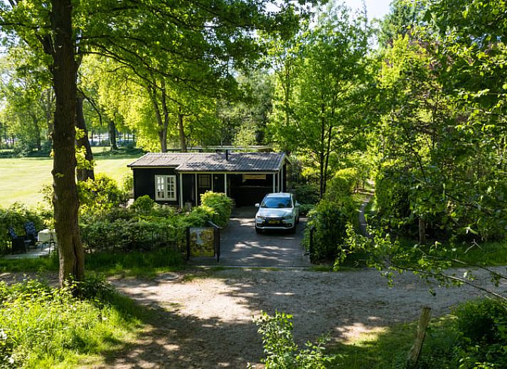 Gezellige veranda van Vakantiehuisje in Nutter, perfect voor ontspanning in Twente, Overijssel.
