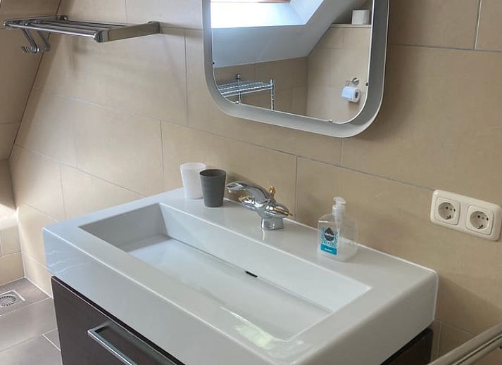 Gezellige woonkamer van Vakantiehuis in Ootmarsum, Nutter, Twente, Overijssel met comfortabele zithoek.