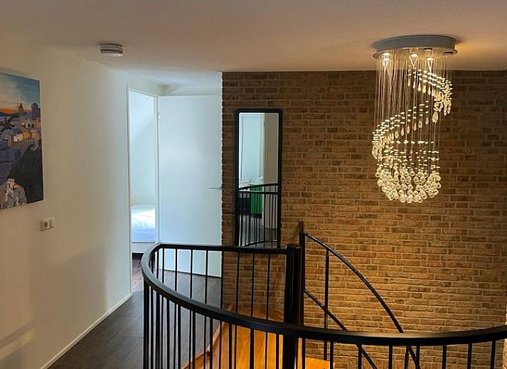 Gezellige woonkamer van Vakantiehuis in Ootmarsum, Nutter, Twente, Overijssel met comfortabele zithoek.