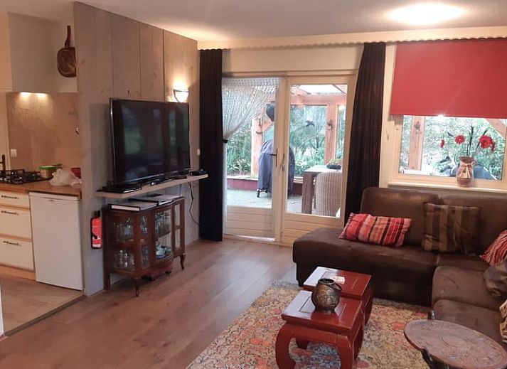 Gezellig vakantiehuis in Nutter, Twente, verscholen tussen weelderige groene bomen in Overijssel.