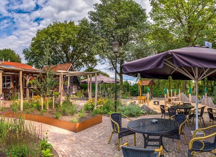 Vakantiehuis in Nutter, sfeervolle woonkamer met houtkachel in vakantiehuis Twente, Overijssel.