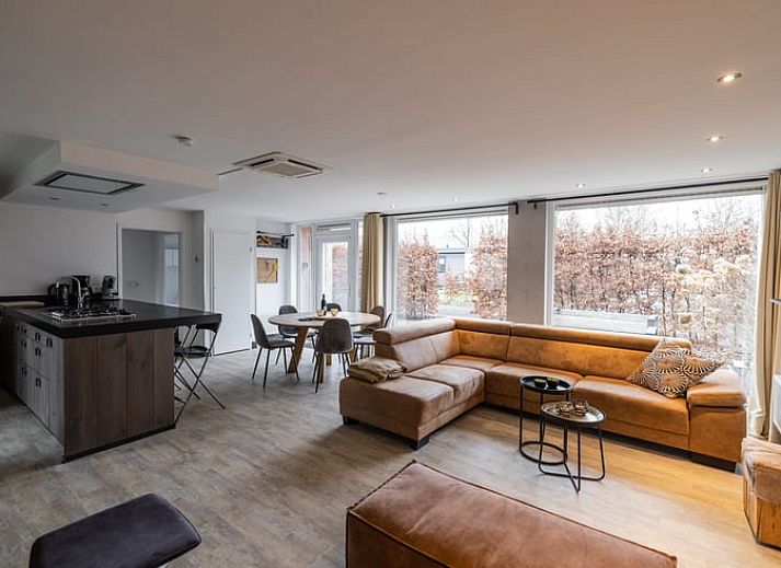 Cozy indoor area of cottage in Den Ham, Twente. Comfortable sitting area with views of nature in Overijssel.