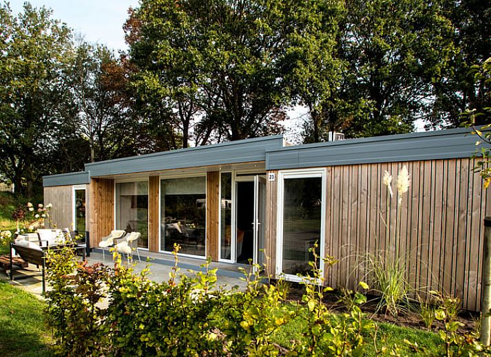 Cozy indoor area of cottage in Den Ham, Twente. Comfortable sitting area with views of nature in Overijssel.