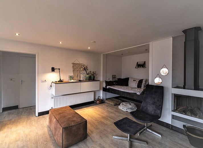 Cozy indoor area of cottage in Den Ham, Twente. Comfortable sitting area with views of nature in Overijssel.