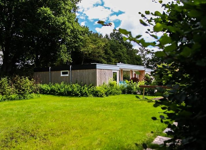 Cozy indoor area of Holiday Home in Den Ham, Twente, with modern kitchen and comfortable seating area in Overijssel.
