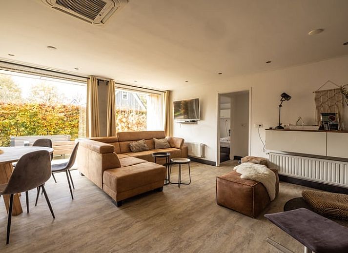 Cozy indoor area of Holiday Home in Den Ham, Twente, with modern kitchen and comfortable seating area in Overijssel.