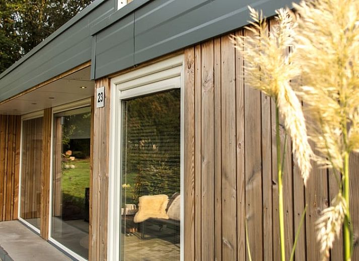 Cozy indoor area of Holiday Home in Den Ham, Twente, with modern kitchen and comfortable seating area in Overijssel.