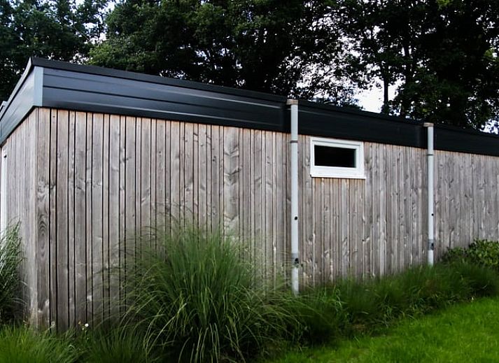 Cozy indoor area of Holiday Home in Den Ham, Twente, with modern kitchen and comfortable seating area in Overijssel.