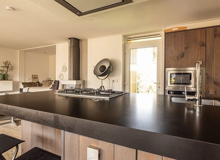 Vacation cottage in Den Ham, Twente, offers a serene outdoor space with terrace and beautiful views of the surrounding countryside in Overijssel.