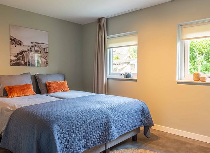 Rustig terras bij Vakantiehuisje in Den Ham, Twente, ideaal voor ontspannen in de buitenlucht.