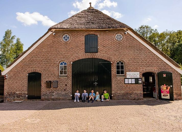 Cozy bedroom in Cottage in Den Ham, Twente, Overijssel with atmospheric lighting and comfortable beds.