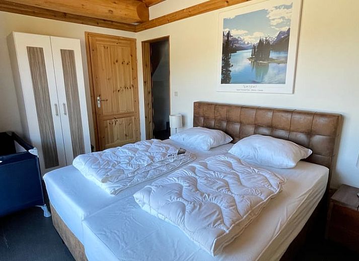 Gemuetliche Veranda des Ferienhauses in Den Ham, Twente, Overijssel, umgeben von Natur und rustikalem Charme.