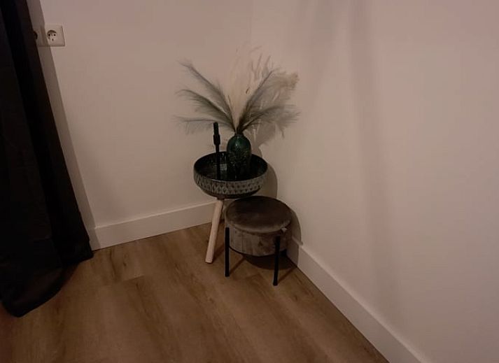 Gezellig terras met uitzicht op de natuur bij Huisje in Den Ham, vakantiehuis in Twente, Overijssel.