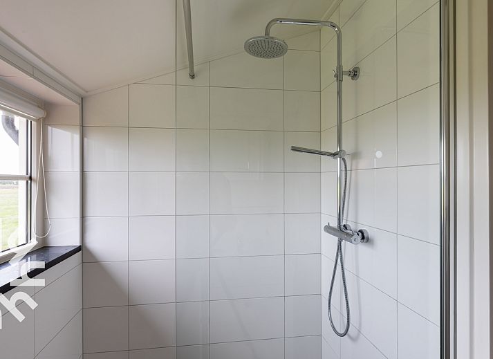 Gezellige eetruimte in vakantiehuis OV404, Den Ham, Twente met landelijke sfeer.