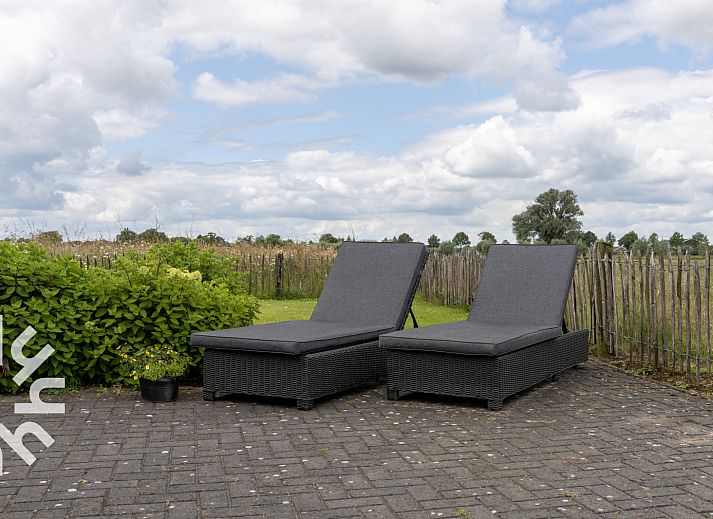 Gezellige eetruimte in vakantiehuis OV404, Den Ham, Twente met landelijke sfeer.