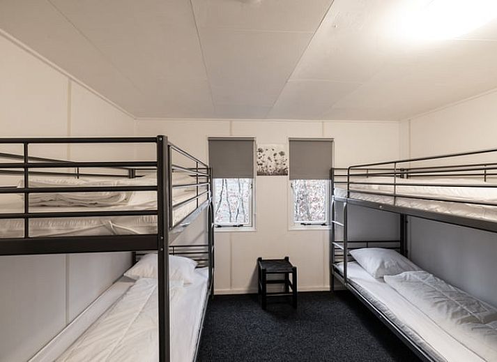 Gezellige eetkamer in Vakantiehuis in Den Ham, Twente, Overijssel, met ruime tafel en comfortabele stoelen voor een ontspannen verblijf.