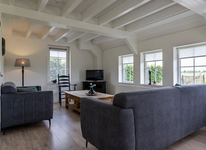 Het Assenhoekje, ein gemuetliches Ferienhaus in Den Ham, Twente, bietet eine herrliche Aussicht auf die gruene Landschaft von Overijssel.